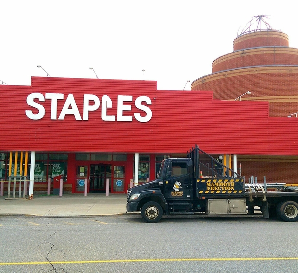 Staples hired this huge dick to fix their awning