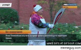 Stranger relighting the Olympic Torch in Russia with a cigarette lighter