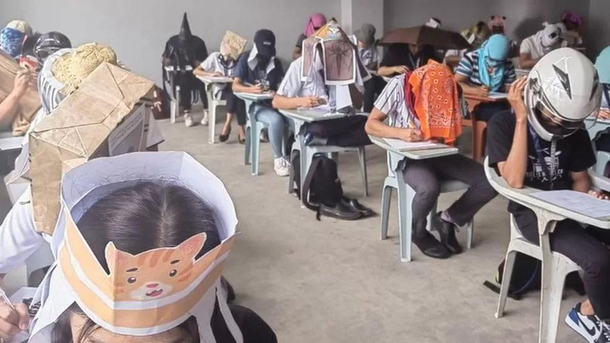 Students were asked to innovate headwear that would block their ability to see their peers answer papers