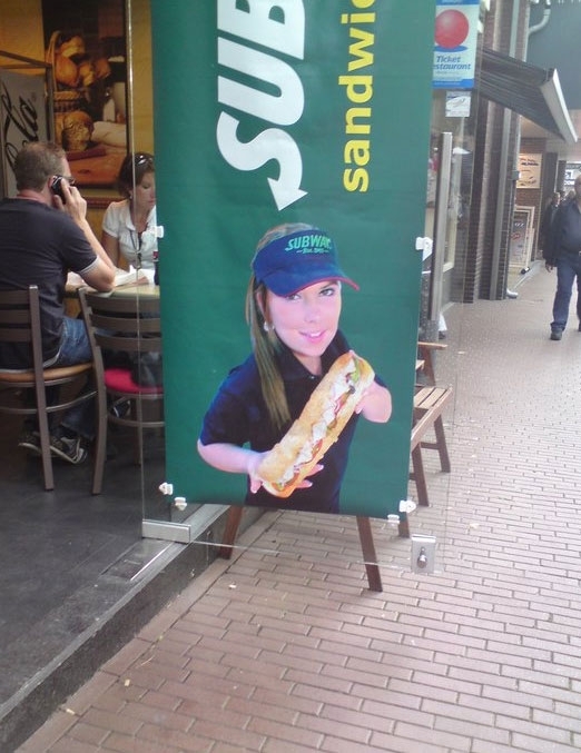 Subway uses midgets to make their sandwiches look bigger