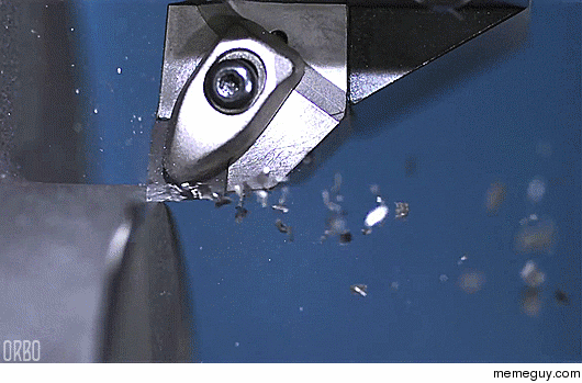 Super slow motion stream of steel shavings