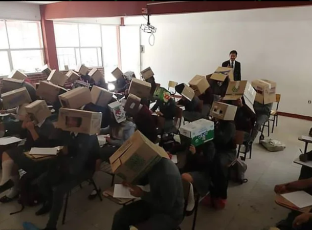 Teacher asks pupils to wear cardboxes on their heads to stop them from cheating