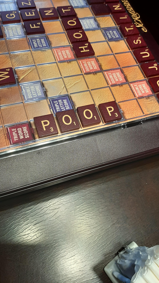 Teaching my yo daughter to play Scrabble She made this word all by herself while I was taking a phone call Im so proud