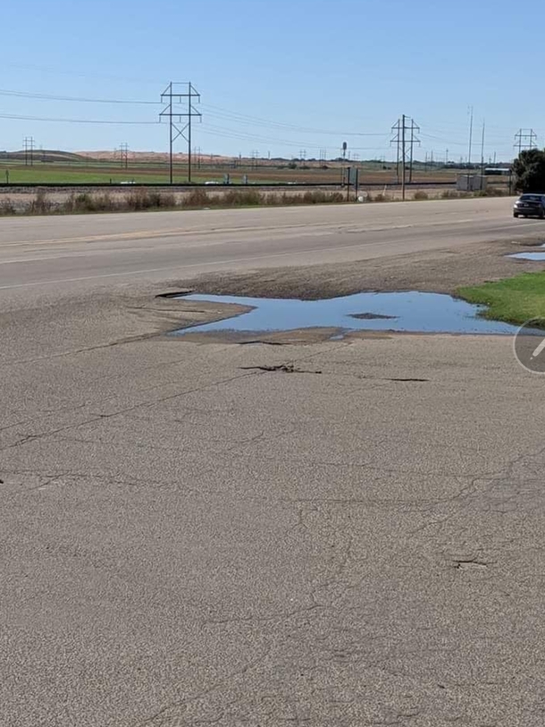 Texas-shaped pothole spotted in Texas