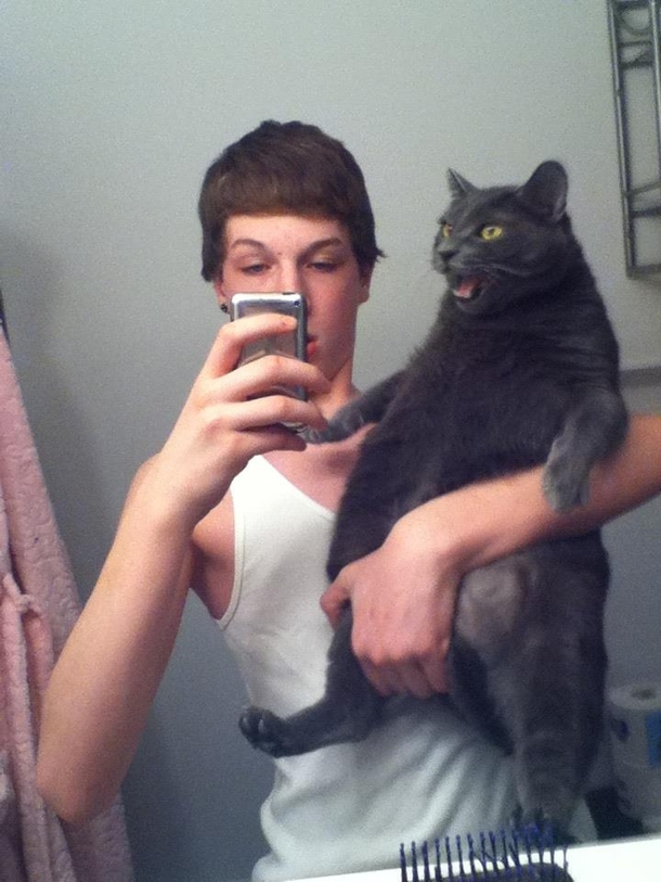 Thats uh not how you hold a cat