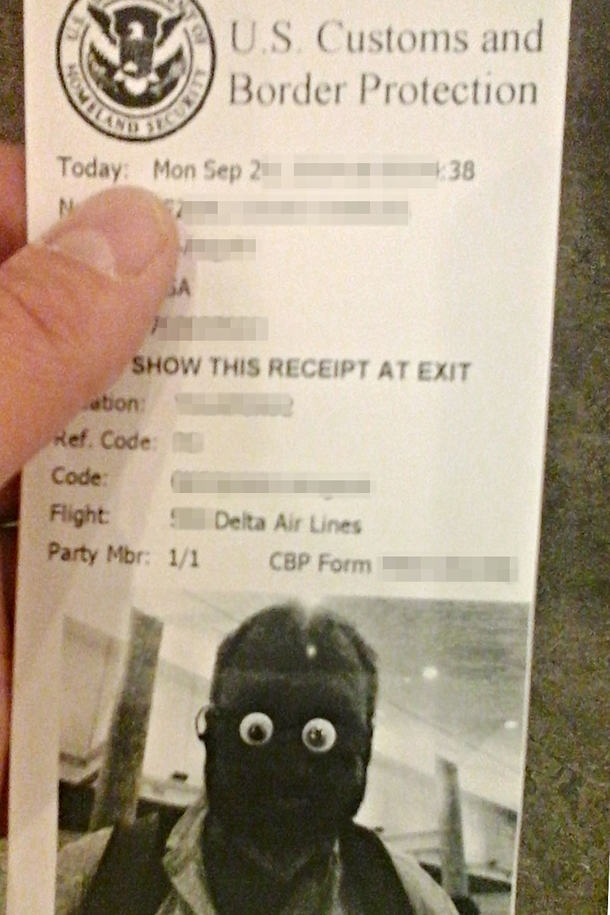 The automated passport checking printers were on the fritz so faces were blacked out I took a big chance with this always travel with a bag of googly eyes