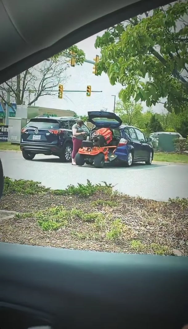 The car salesman told me this hatchback could hold a lawnmower