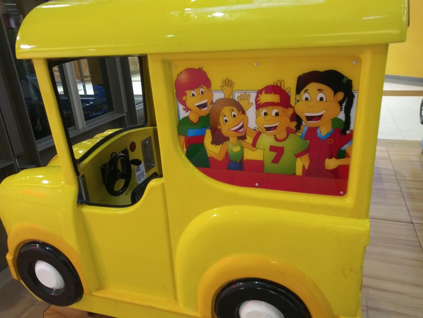 The cartoons on this kiddie ride look like Glenn quamires illegitimate kids