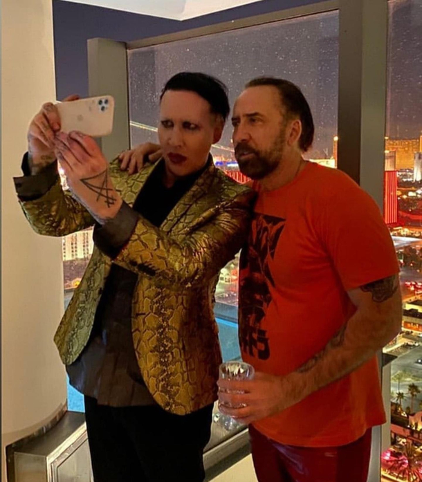The crossover weve all been waiting for Proof that Marilyn Manson and Nicholas Cage are Not the same person