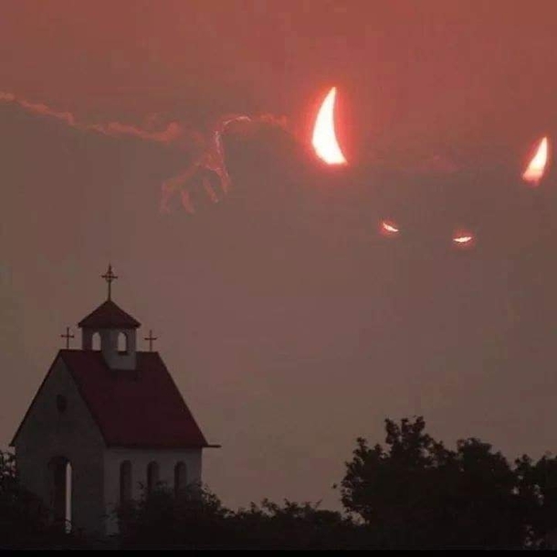 The devil is camping above the church