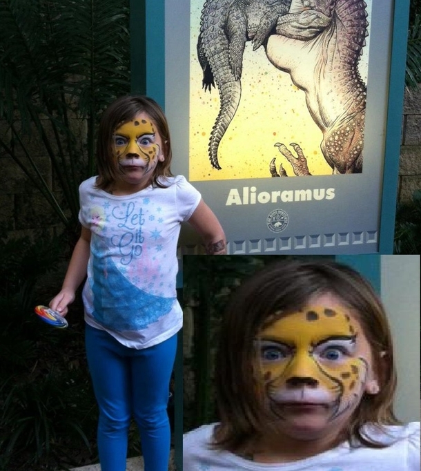 The dinosaur behind her let out a loud roar just as I took the picture