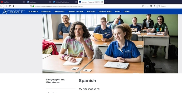 The dude on the North Carolina university Asheville website is holding a toothbrush instead of a pen