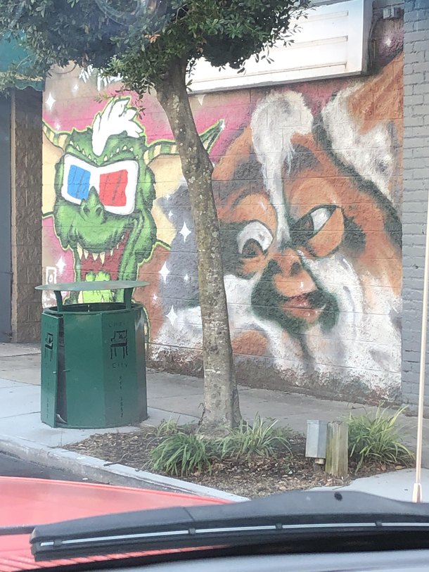 The front of a bar in the middle of downtown