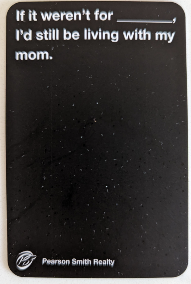The front of a business card a realtor gave me