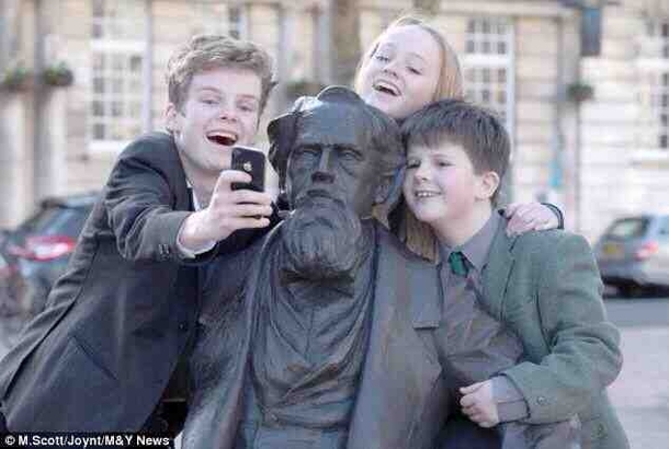 The great-great-great grandchildren of Dickens take a selfie with him on his nd birthday