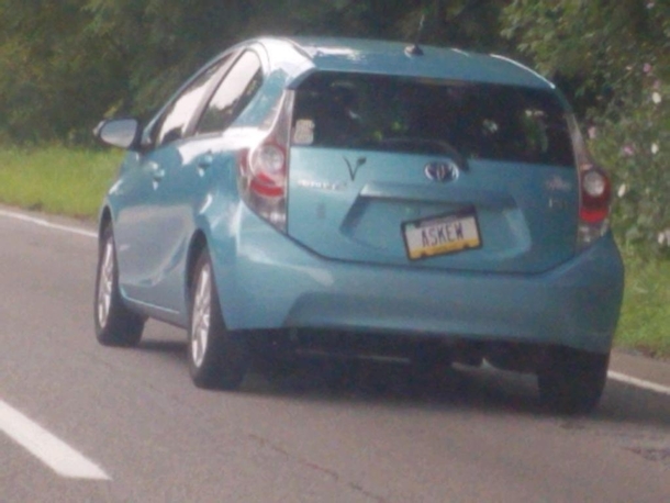 The license plate seems a bit Askew