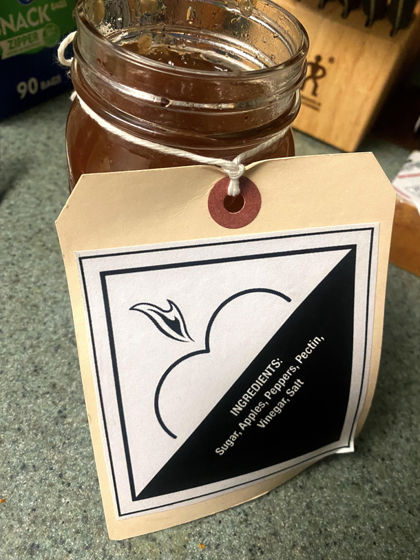 The logo for this spicy apple jelly