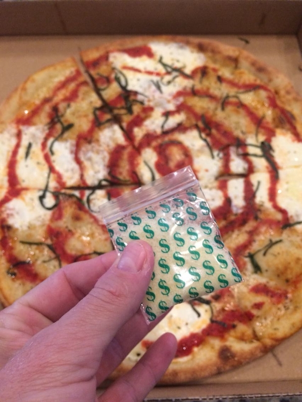 The parmesan cheese with my pizza came in a coke baggie