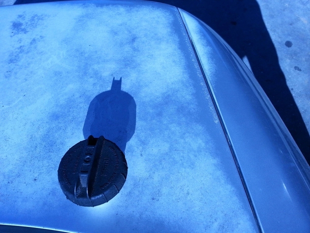 The shadow of this guys gas cap looks like Batman