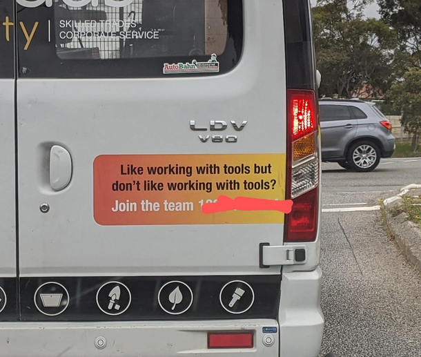 The sign on the back of this work van