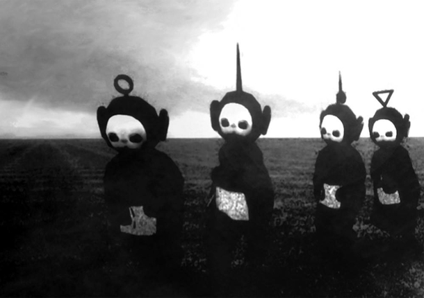 The teletubbies look like figures from a horror movie when you put them in black and white