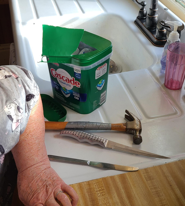 The tools my grandmother used to open a dishwasher pack
