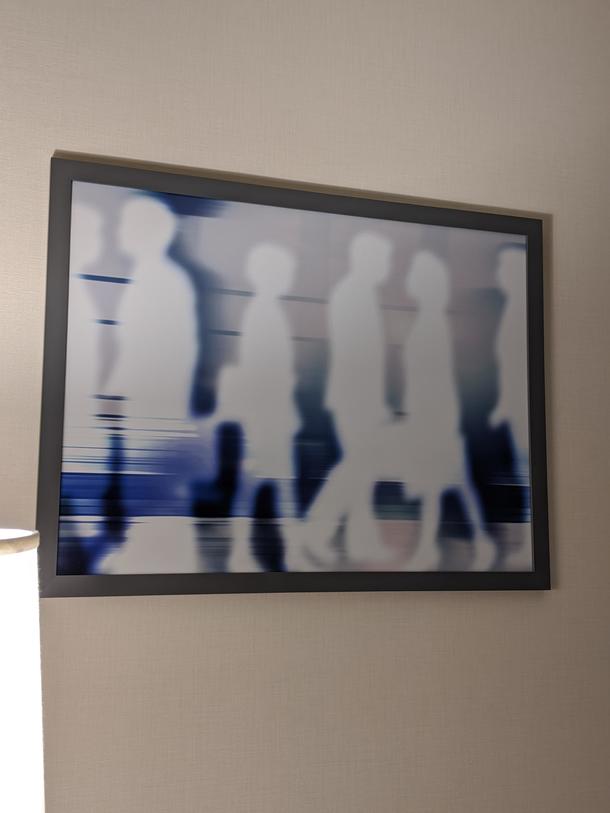 Theres something about the guy on the right - artwork in my hotel room