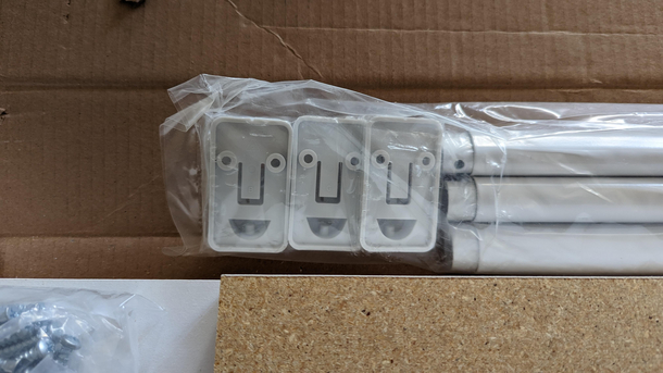 These happy folk from a closet organization kit hanger rod mounts