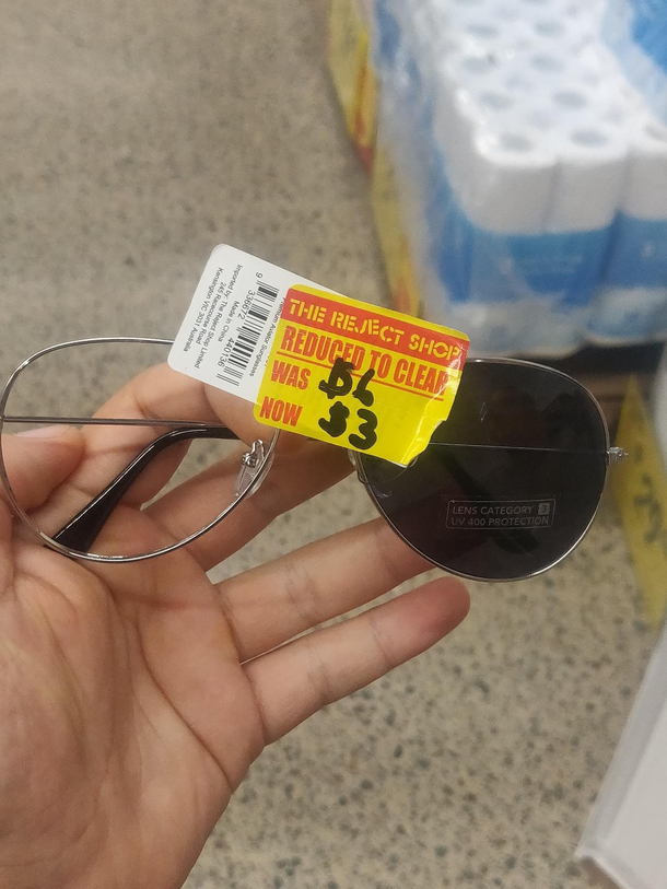 These sun glasses are half price because theyre missing a lens