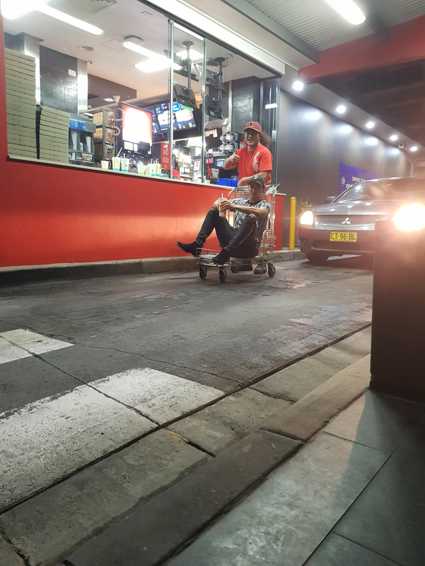 These two blokes came to the Maccas driv thru on a Woolies trolley And still managed to get served