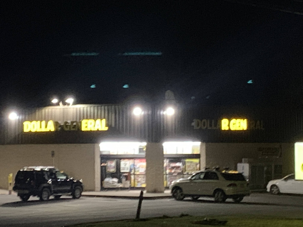 These two partially lit signs complete each other