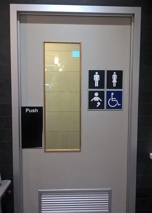 This bathroom caters for men women people in wheelchairs AND one legged babies What a world we live in