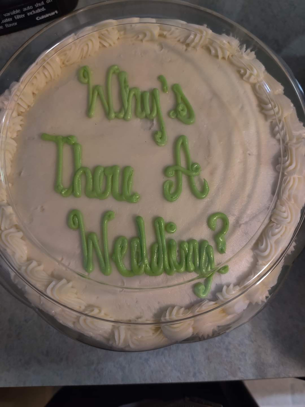 This cake was supposed to spell Wiser Wedding
