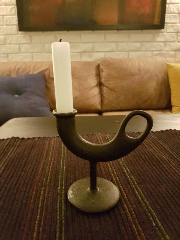 This candle holder makes me think Dickbutt should get a girlfriend
