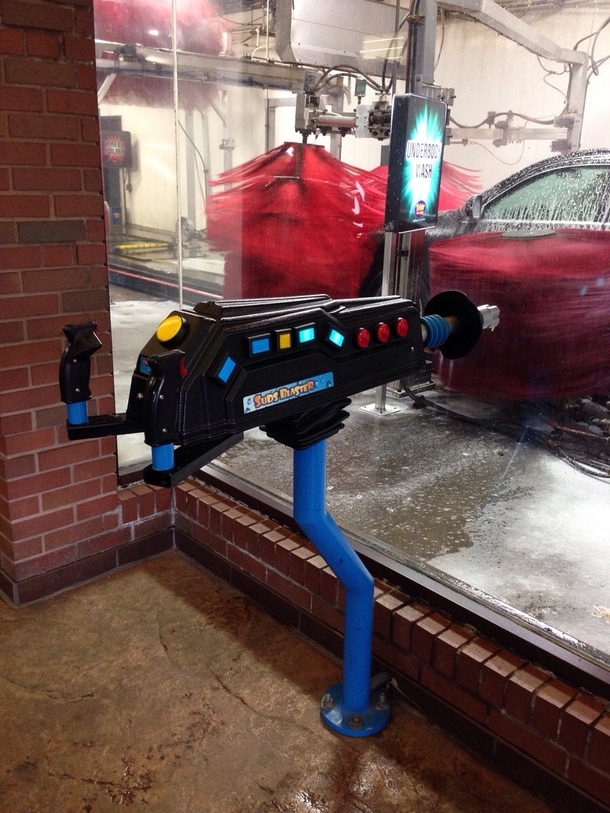 This car wash has a gun where you can shoot cars as the come by
