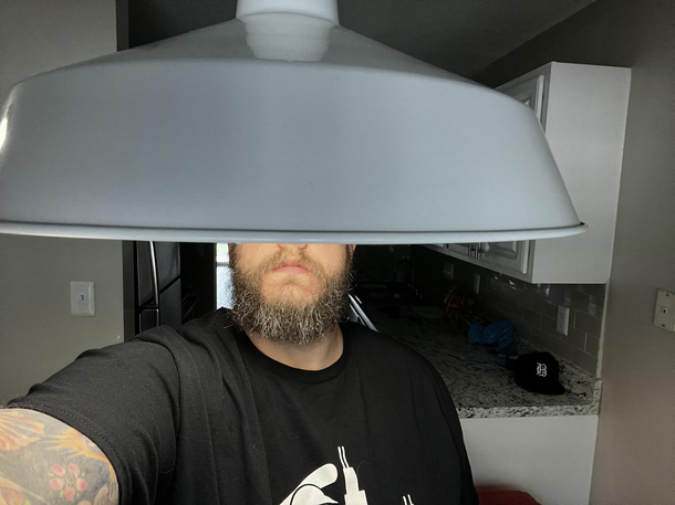 This ceiling light in my new apartment Im only  tall