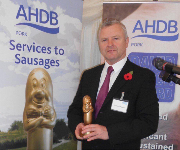 This dude receiving his prestigious sausage award