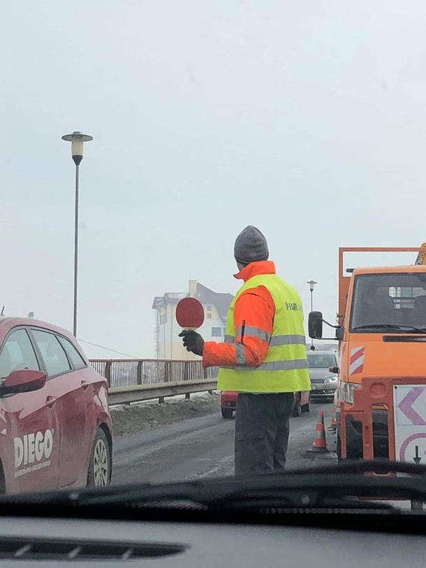 This guy controlling traffic with table tennis bat