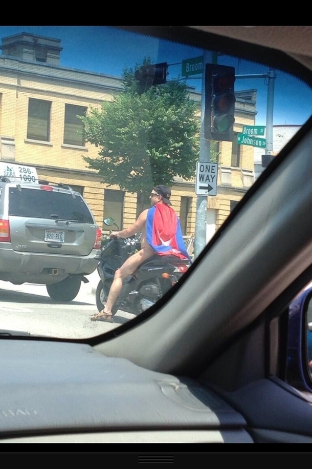 This guy is frequently spotted in Madison Wisconsin he is referred to as Thong Cape Scooter Man