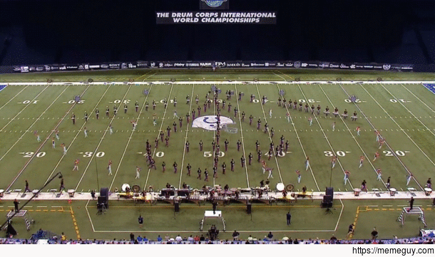 This has been posted numerous times but always in unwatchable quality So here it is in HD  Carolina Crown Drum and Bugle Corps marching a rotating pyramid
