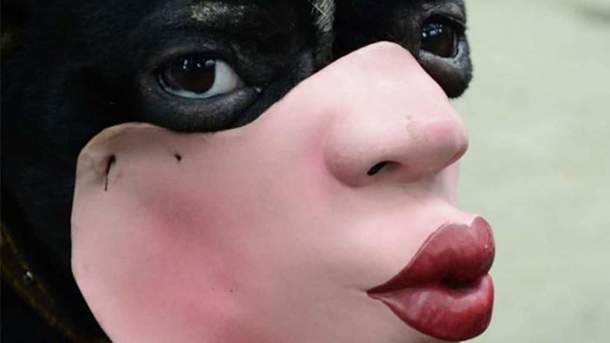 This is a dog wearing a muzzle