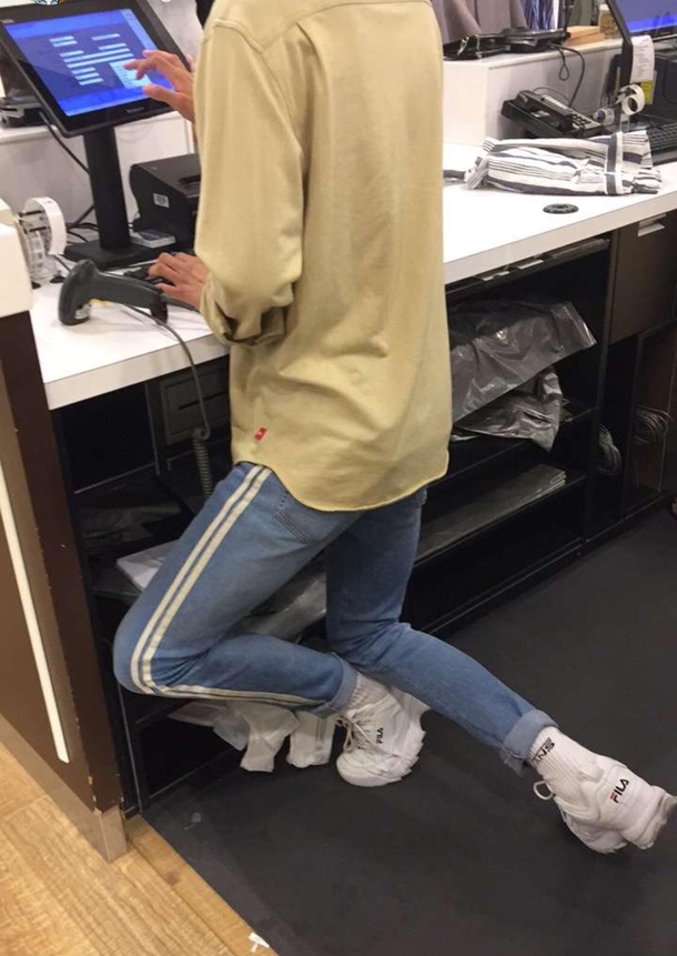 This is how my friends coworker stands at his desk so he doesnt have to hunch over