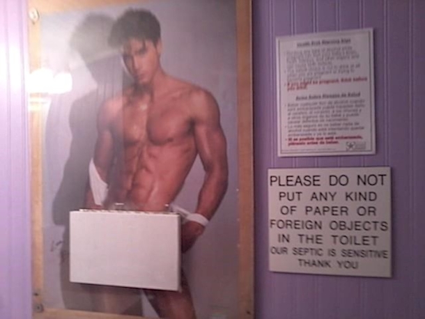 This is in the womens restroom at the Purple Cow Restaurant in Freeport Tx If you lift the little white door a loud buzzer goes off throughout the entire restaurant forcing you to do the walk of perverted shame out of the restroom