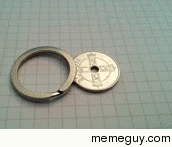 This key chain ring fits perfectly over a coin Its incredibly satisfying