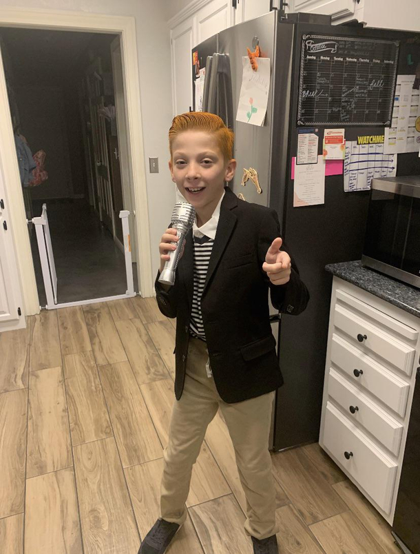 This kid dressed up as Rick Astley to rickroll his entire school
