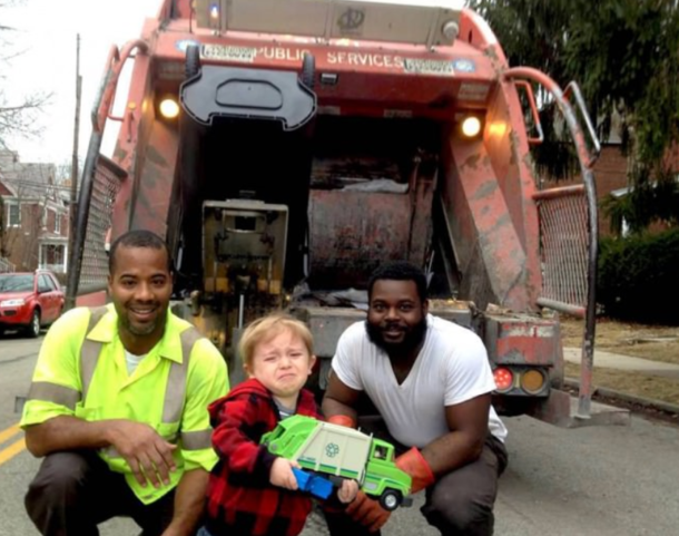 This kid is proud of his truck and meeting his heroes
