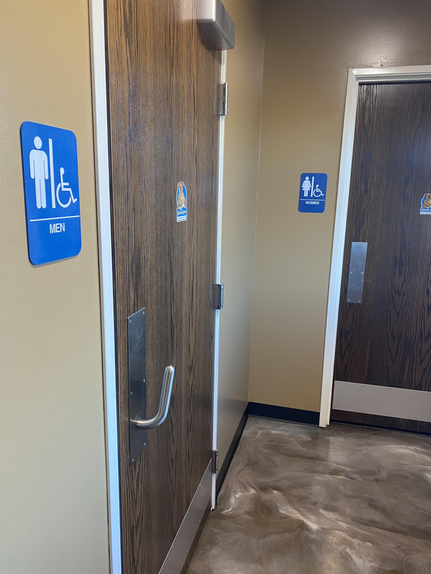 This overly gendered bathroom door