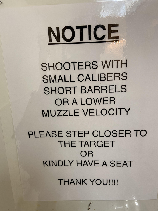 This sign above the urinals at a shooting range