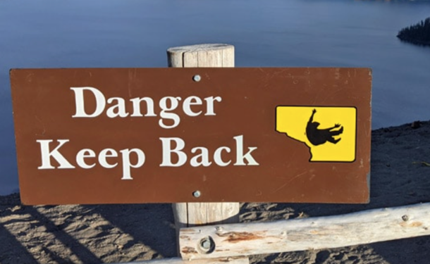 This sign at Crater Lake NP makes falling into the lake look awesome