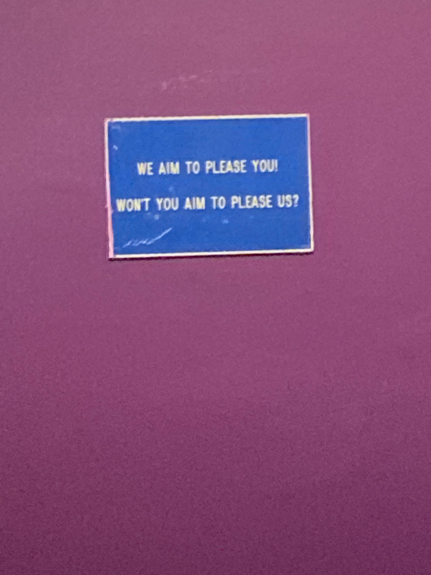 This sign I saw in a public bathroom right above the toilet